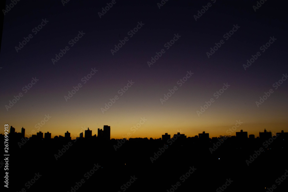 Sunset cityscape nightfall skyline
