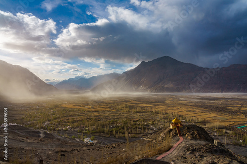 Landscape from Diskit Monastery. Diskit Monastery also known as Deskit Gompa or Diskit Gompa is the oldest and largest Buddhist monastery in the Nubra Valley of Ladakh, Kashmir, India. photo