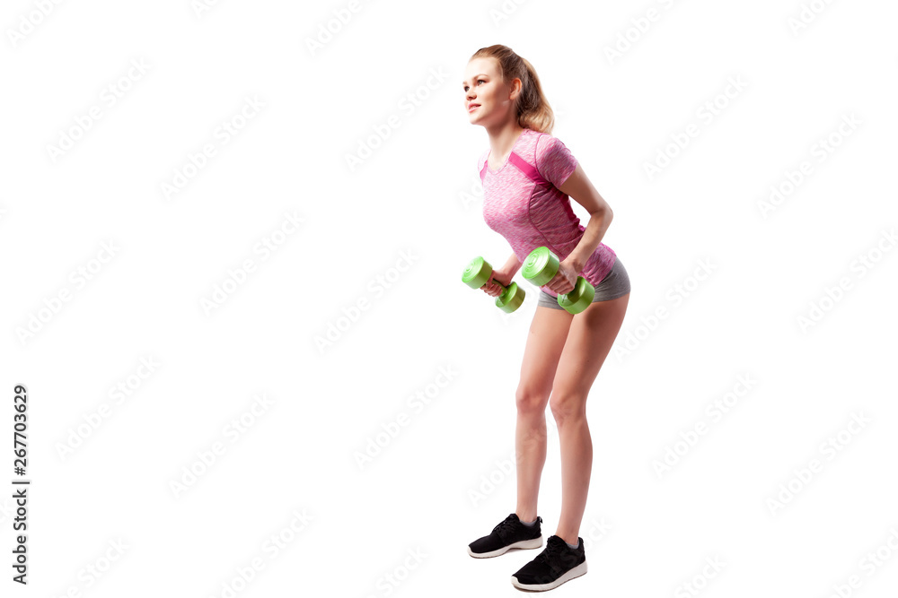 Young woman in sports clothes makes deadlift with weights dumbbell in semi-sitting position on white isolated background. Side view.Fit girl living an active lifestyle Young woman in sports clothes makes deadlift with weights dumbbell in semi-sitting position on white isolated background. Side view.Fit girl living an active lifestyle