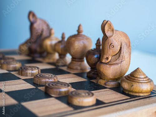 Thai wooden chess on checker board
