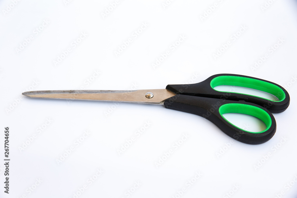 Scissors for office and home. The plastic handles of the scissors. Scissors for office and home. The plastic handles of the scissors.