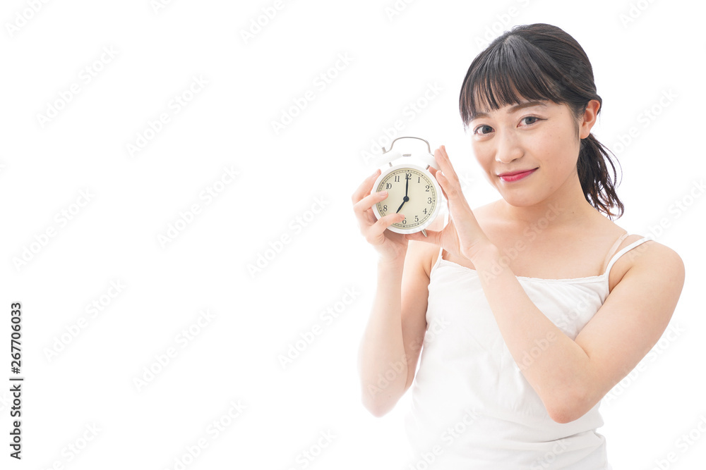 早起きをする若い女性 早起きをする若い女性