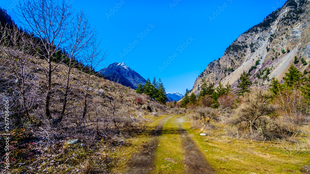 Dirt road in the Coast Mountains at the Duffey Lake Road near the town of Lillooet in British Columbia, Canada