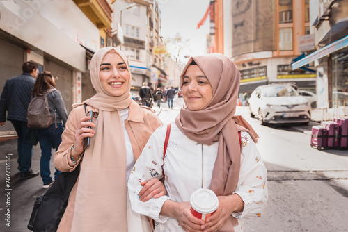 Photography Beautiful Muslim women walk and chat together