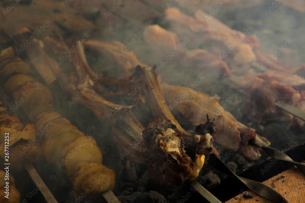 Baked potatoes and meat kebab Baked potatoes and meat kebab