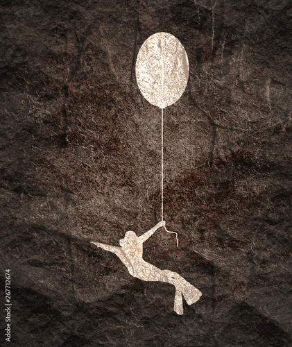 Foto The young man in diver suit flying with toy balloon