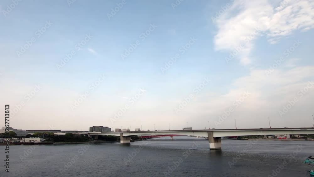 Japanese railway car window. A view of the canal and the bridge Japanese railway car window. A view of the canal and the bridge