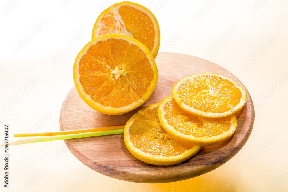 oranges sliced on the table isolated on white background oranges sliced on the table isolated on white background