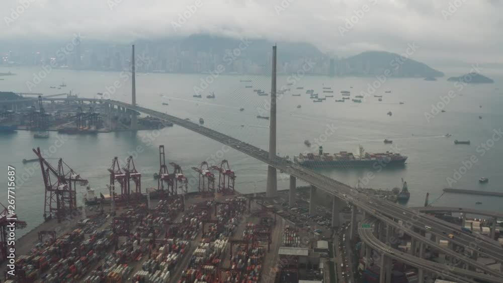 Cargo ship with crane and container at pier Aerial scene drone view in Day time 4k video Cargo ship with crane and container at pier Aerial scene drone view in Day time 4k video