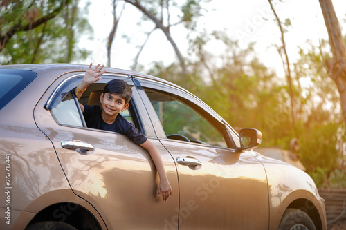 Cute Indian child in car