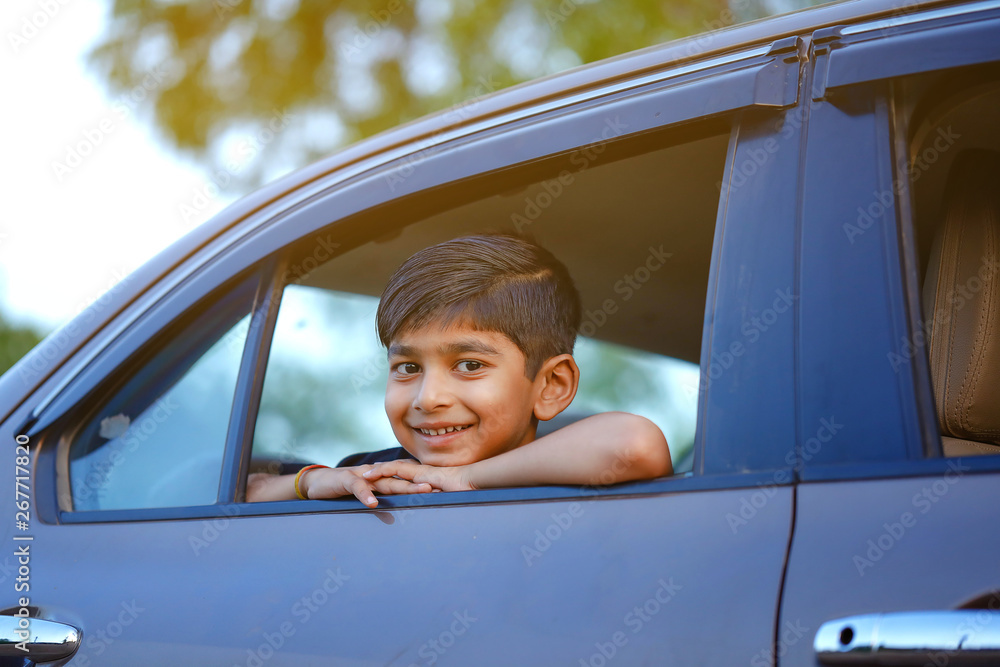 Cute Indian child in car Cute Indian child in car