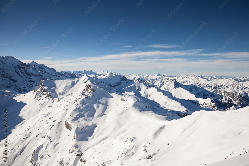 High in the mountains, snow-capped peaks High in the mountains, snow-capped peaks