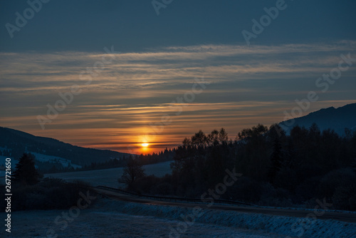 beautiful sunrise in winter in the mountains