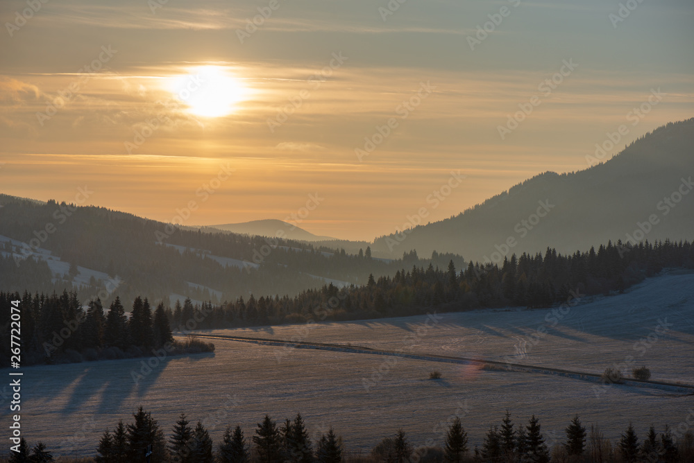 Fototapeta premium beautiful sunrise in winter in the mountains