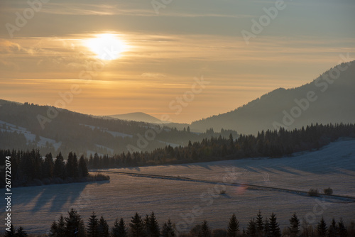 beautiful sunrise in winter in the mountains © Martins Vanags
