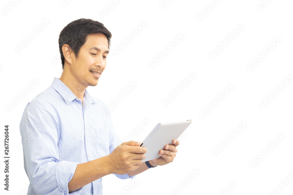 Businessman working on the tablet isolated in clipping path. Businessman working on the tablet isolated in clipping path.