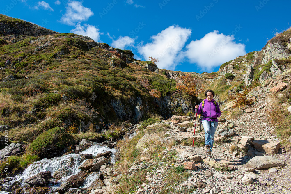 woman hiker on the path in the french Pyrenees