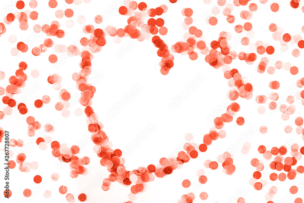 Bright coral confetti isolated on white background. Bright coral confetti isolated on white background.