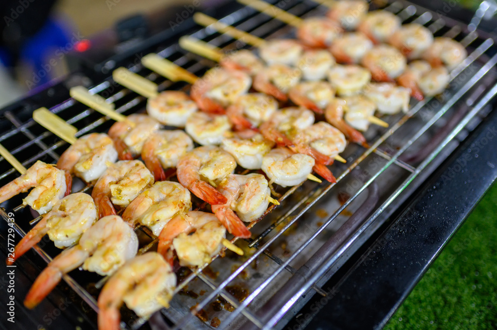 Grilled butter shrimps skewer in stick Grilled butter shrimps skewer in stick