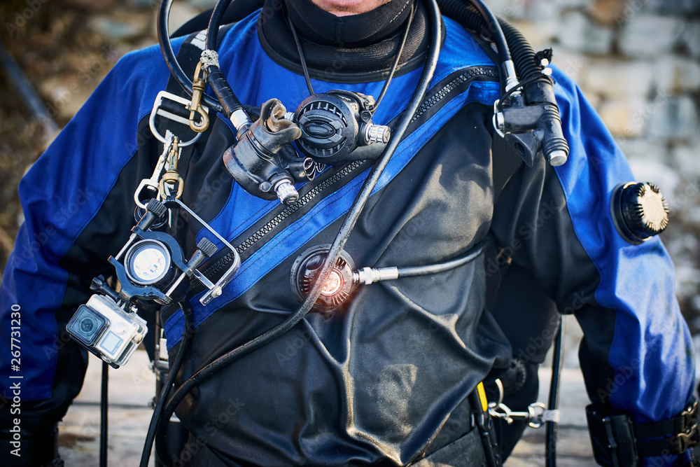 Submersion under water with balloons outfit in flippers and a mask ...