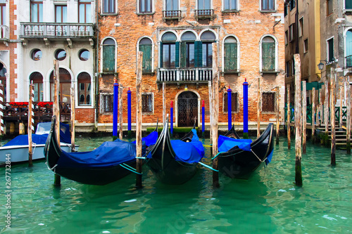 Venice, Italy. Gondolas in Grand Canal near old house. Venice Down Town © dzmitrock87