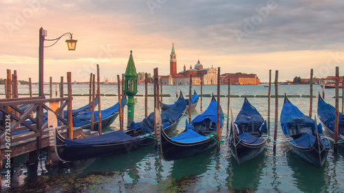 Venice landscape at sunset. Venice gondolas on San Marco square, Grand Canal, Venice, Italy