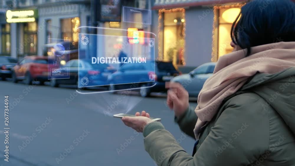 Unrecognizable woman standing on the street interacts HUD hologram with ...