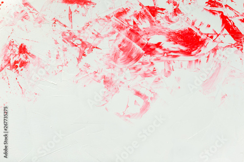 Textured white marble background with red painting