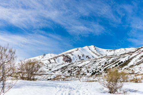 snowy mountains with blue sky