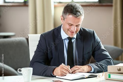 Handsome mature businessman...