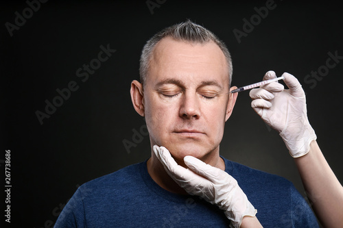 Middle-aged man and hands h...