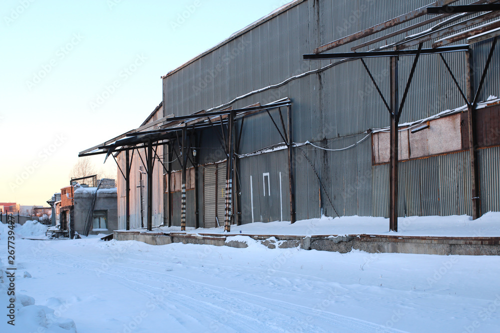 Metal building storage room hangar for storage production workshop with cargo ramp for cargo transportation Metal building storage room hangar for storage production workshop with cargo ramp for cargo transportation