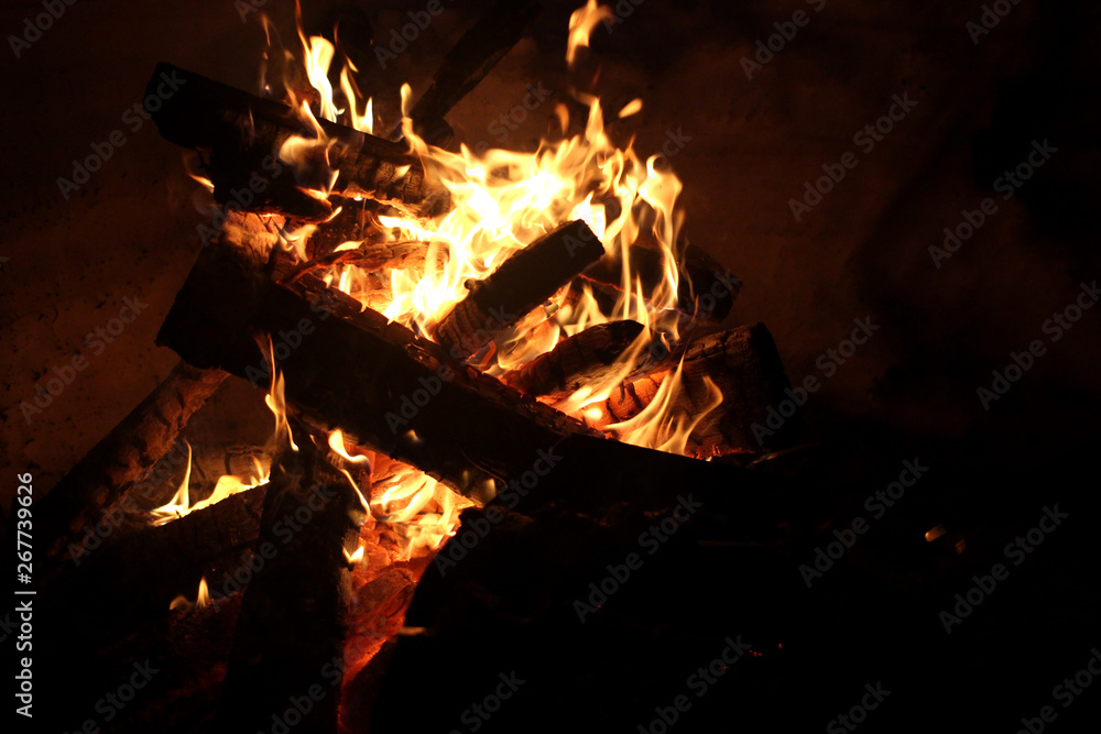 burning flame wood fire logs in the oven grill for tourists burning flame wood fire logs in the oven grill for tourists