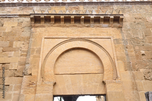 Door and facade of Deanes, Moorish facade of the Great Mosque in Cordoba, Andalusia, Spain photo