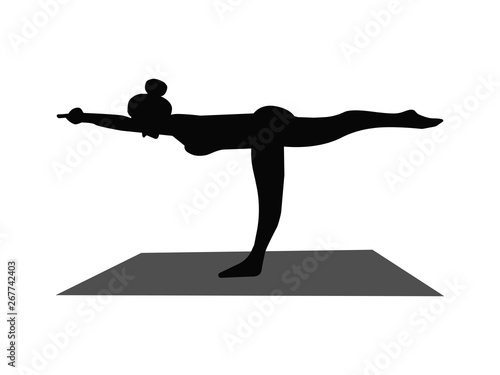 silhouette of a woman doing yoga
