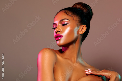 Beauty portrait fashion girl with color lighting filters. Beauty girl face close up.  Closeup Sexy woman with copy space. Neon light blue and pink color. - image  