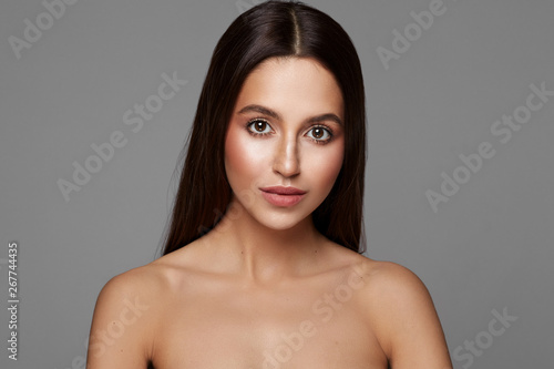 Portrait of young female model with big brown eyes