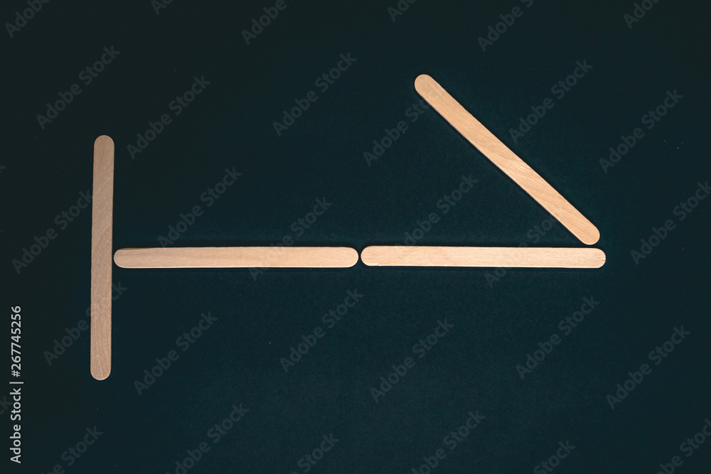 Numbers made of wood sticks isolated on black background Numbers made of wood sticks isolated on black background
