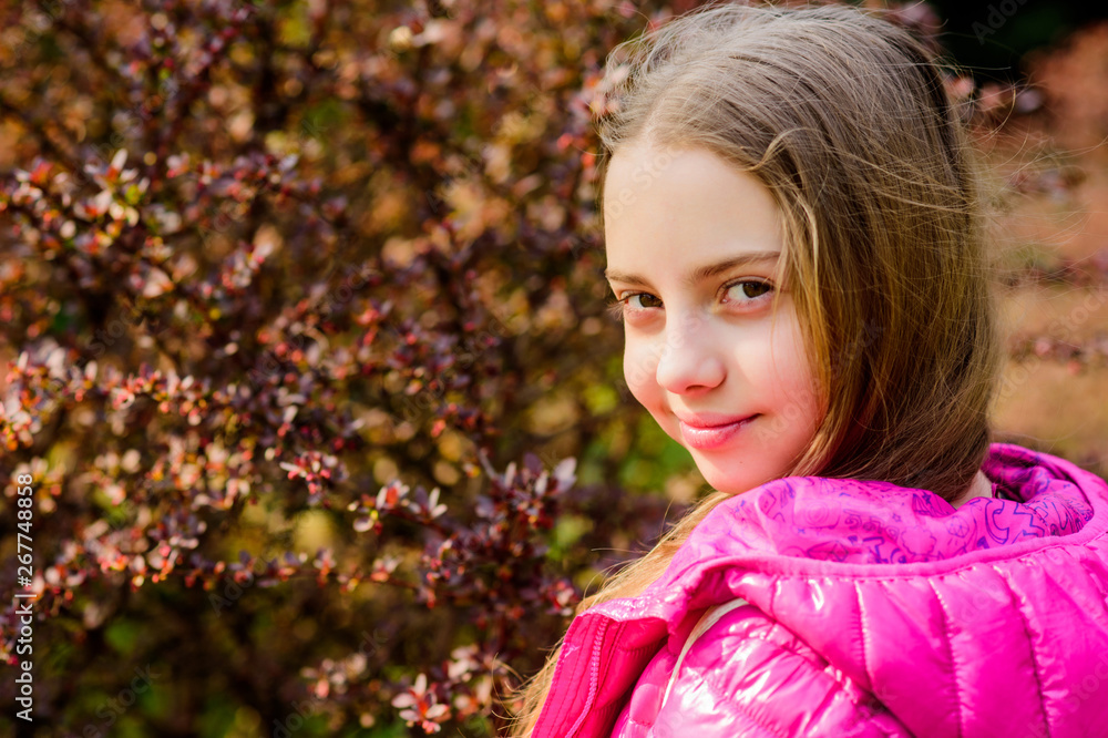 Fototapeta premium Spring bloom fragrance. Girl teen walk in botanical garden. Peaceful environment garden. Enjoying nature. Kid cute fancy child spend time in park. Explore garden. Excursion to botanical garden