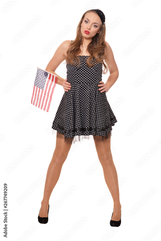 Portrait of young woman posing with flag of USA isolated Portrait of young woman posing with flag of USA isolated