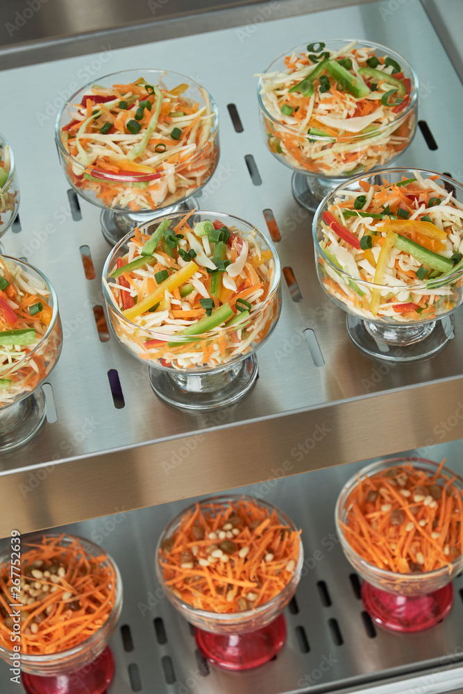 Fototapeta premium Showcase fridge for catering with cooked food