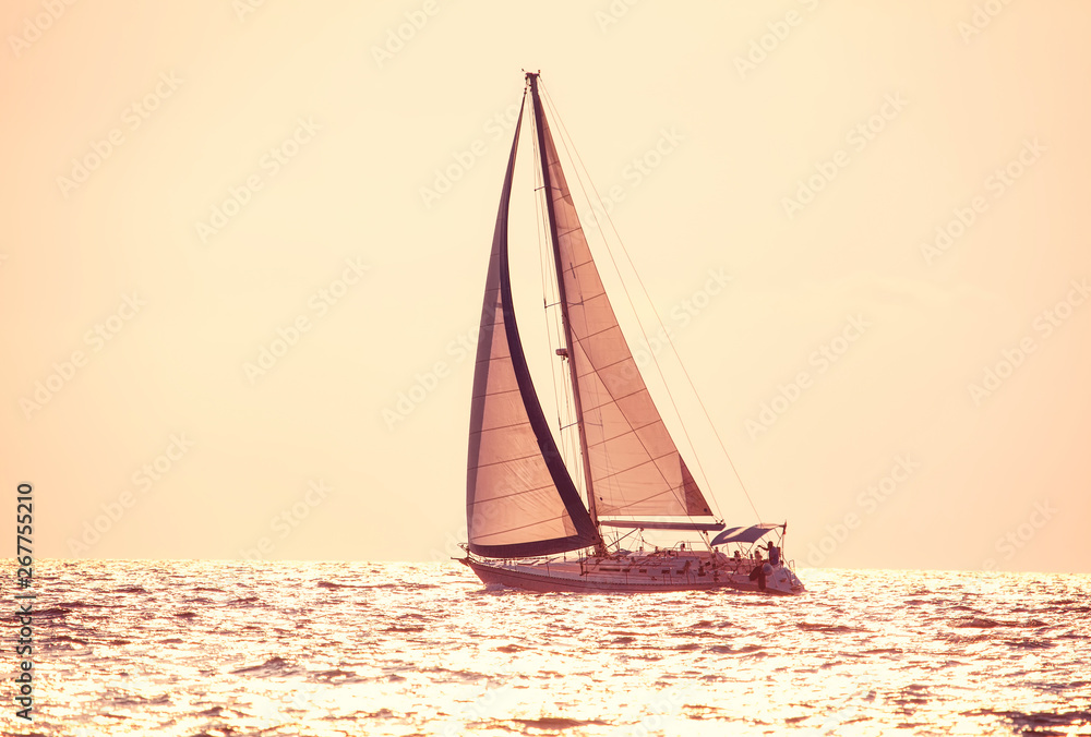 Fototapeta premium modern yacht sailing on the skyline