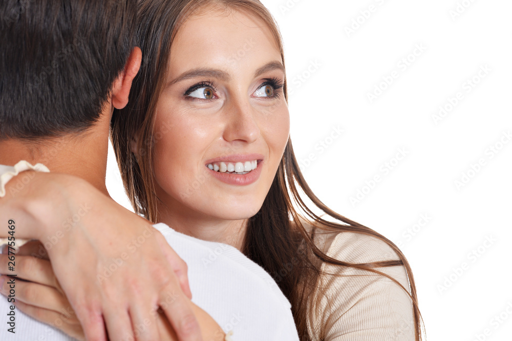 Portrait of happy young couple posing on white background Portrait of happy young couple posing on white background