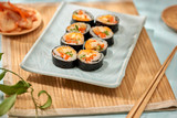 Korean roll Gimbap(kimbob) made from steamed white rice (bap) and various other ingredients