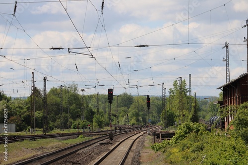 Rail track with tank car and adjacent station building