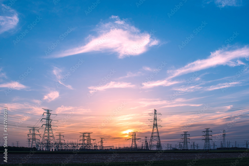 Silhouette of Power Supply Facilities at Sunset