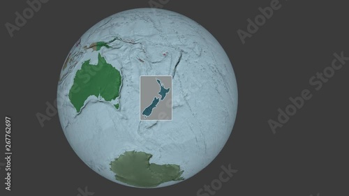 New Zealand area bounds outlined on the end cap of rectangular tube and animated against the spinning administrative globe. Animation 3D