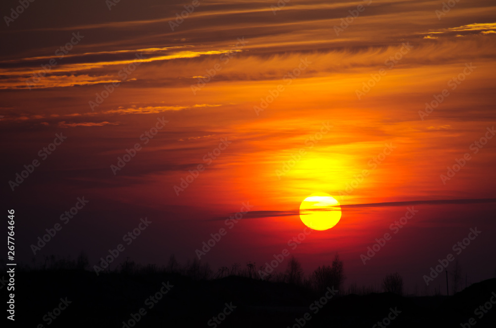 Bright big sun on the sky with yellow orange gradient colors