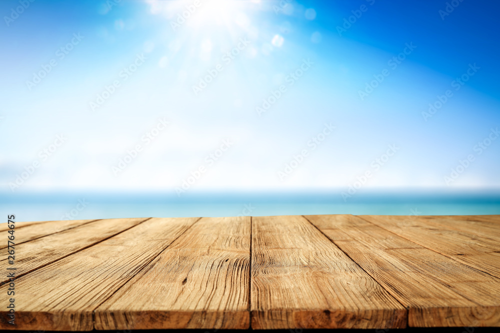 Desk of free space and summer background of sea Desk of free space and summer background of sea