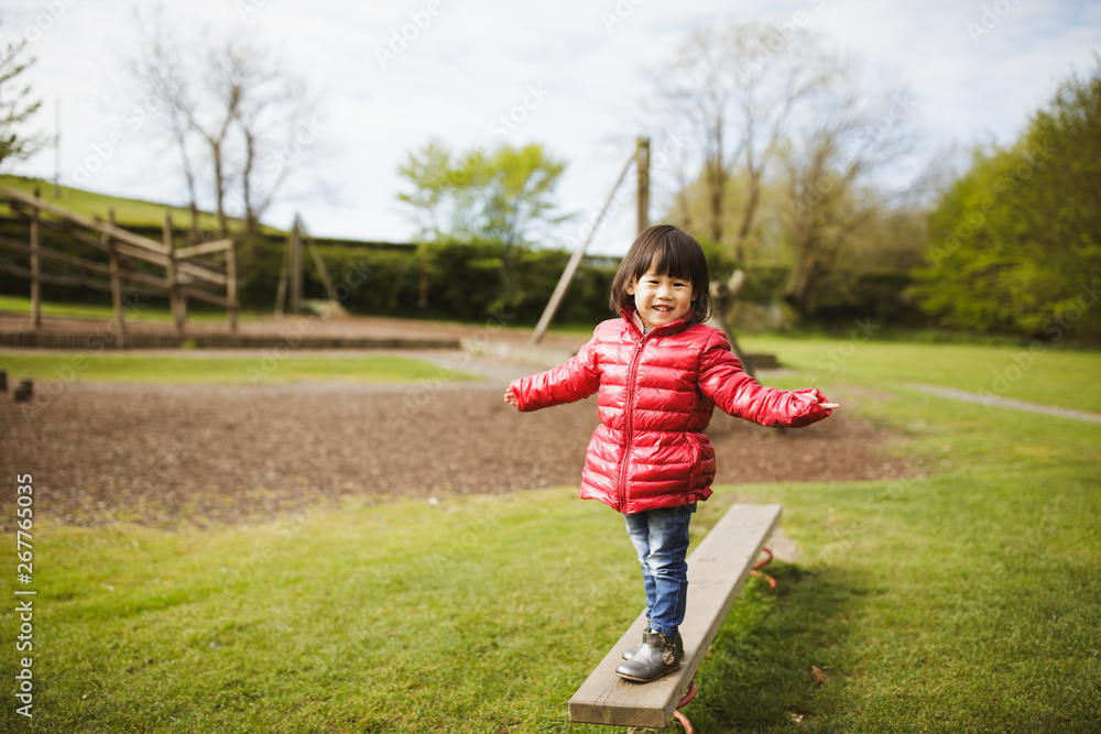 toddler girl play at outdoor playground toddler girl play at outdoor playground